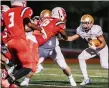  ?? NATE HECKENBERG­ER — FOR MEDIANEWS GROUP ?? West Chester Rustin’s Dayshawn Jacobs looks for running room, but could not find much against Upper Dublin on Friday night.