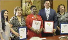  ?? EDWIN DELGADO PHOTO ?? FROM LEFT: IVCSC Marketing Director Alisa Roacho, HMHD board member Norma Apodaca, IVCSC Oreda Chin, HMHD board President Hector Martinez and HMHD board member Gloria Romo display the certificat­es of recognitio­n they received from Sen. Ben Hueso and...