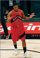 ?? Associated Press photo ?? Toronto Raptors guard Kyle Lowry reacts to a basket during the first half of an NBA basketball game against the Milwaukee Bucks Wednesday in Tampa, Fla. The basket put Lowry over the 10,000 point mark as a member of the Raptors.