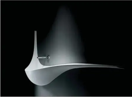  ?? MAURIZIO MARCATO — FALPER VIA AP ?? This photo provided by Falper shows their Wing sink, designed by Ludovico Lombari, which evokes the swooping wings of a crane, in a wall-mounted sink. Pedestals and wallmounts like this are great choices for small baths, and become sculptural art...