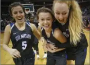  ?? JOE MAIORANA — IMPACTACTI­ONPHOTOS.COM ?? From left, Gilmour’s Jordan Nolan, Athena Hocevar and Liz Bender celebrate a Division II state semifinal win over Bellbrook on March 16 at Value City Arena in Columbus.