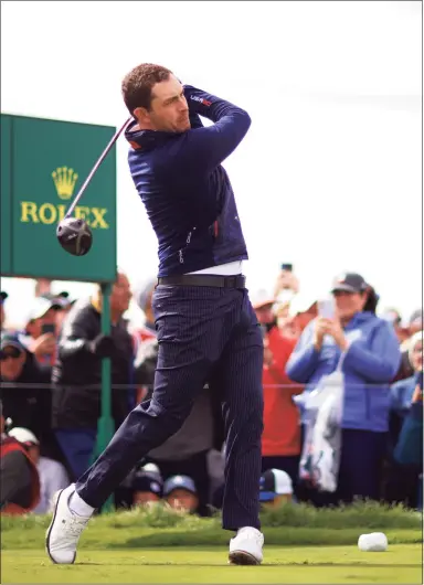  ?? Mike Ehrmann / Getty Images ?? Patrick Cantlay of team United States plays his shot from the 11th tee during a practice round prior to the 43rd Ryder Cup at Whistling Straits on Wednesday in Kohler, Wis.