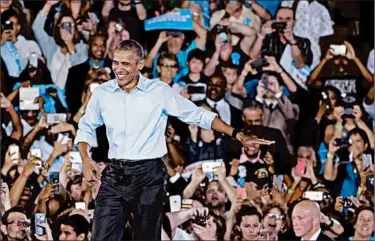  ?? JOHN LOCHER/AP ?? President Barack Obama arrives at a rally recently in North Las Vegas, Nev., to boost Hillary Clinton’s campaign.