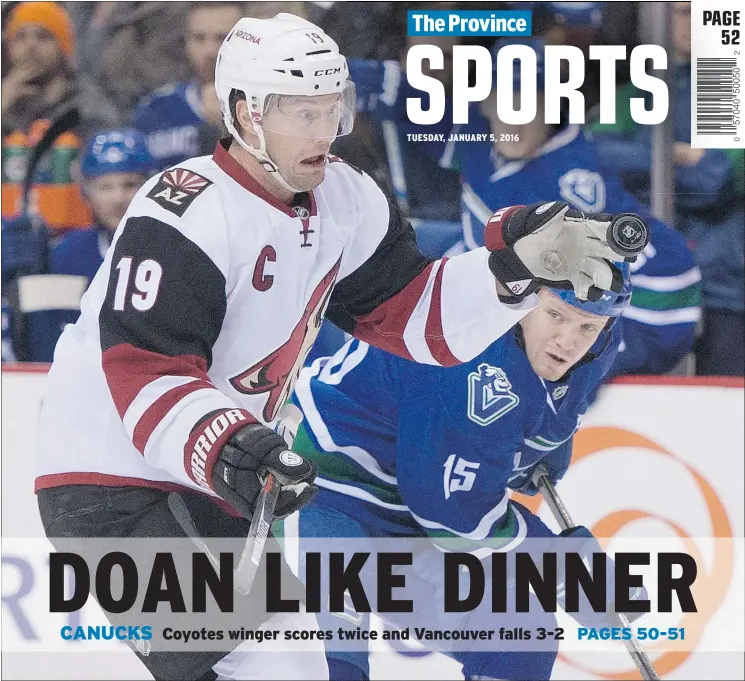  ?? — THE CANADIAN PRESS ?? Coyotes right-winger Shane Doan settles the puck with his glove in front of Vancouver Canucks right-winger Derek Dorsett on Monday.