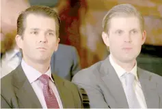  ??  ?? File photo shows Donald Trump Jr (left) and Eric Trump sit in the audience waiting to watch their father announce his nominee for the empty associate justice seat. — Reuters photo
