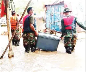  ?? FACEBOOK ?? Floodwater­s in Banteay Meanchey province’s Malai district on Wednesday.