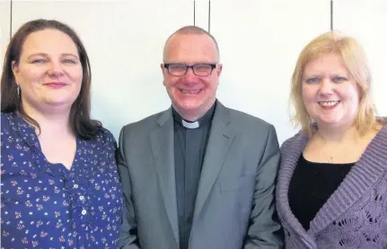  ??  ?? Harvest Rev Leslie Milton, pictured with new elders Maleen Meek and Fiona Hamilton, welcomed the donations