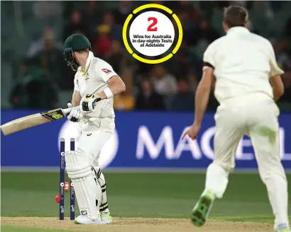  ?? AP ?? Wins for Australia in day-nights Tests at Adelaide England’s Craig Overton picked up the key wicket of Australia’s captain when he bowled Steve Smith for 40 in the evening session. —