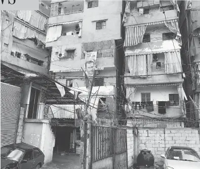  ?? MICHAEL PETROU ?? The Shatila refugee camp in Beirut where Wadad Jomah and her family live in an apartment.