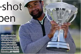  ?? AP PHOTO ?? Tony Finau holds up the trophy at the end of the final round after winning the Houston Open golf tournament on Sunday, Nov. 13, 2022 (November 14 in Manila), in Houston.