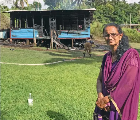  ?? Photo: Shratika Naidu ?? Urmila Devi standing in front of her house that was burnt down in Emily Road, Siberia, Labasa on May 2, 2022.