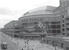  ?? MARY SCHROEDER/ DETROIT FREE PRESS ?? The exterior of Ford Field, the home of the Detroit Lions, is seen in downtown Detroit. The domed stadium could be in the running to host a Super Bowl in the near future.