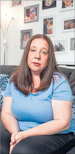  ??  ?? Mum Leigh Allan at home surrounded by pictures of Amy