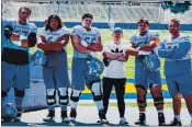  ?? PHOTO COURTESY OF CAM RADFORD ?? San Jose State’s Cam Radford, third from right, has elevated the football program’s presence on social media in the team’s best season since 1939.