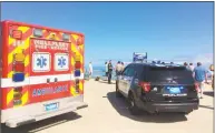  ?? Eric Williams / Associated Press ?? Emergency personnel respond to Newcomb Hollow Beach in Wellfleet, Mass, on Saturday, Sept. 15, 2018. The Cape Cod Times says rescue crews responded to Newcomb Hollow Beach in Wellfleet at around noon Saturday after one person was apparently bitten by a shark.