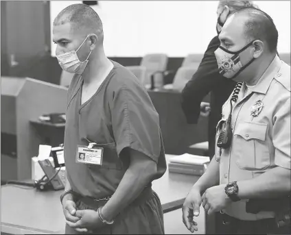  ?? BUY THESE PHOTOS AT YUMASUN.COM PHOTO BY RANDY HOEFT/YUMA SUN ?? IVAN SOQUI (LEFT) IS ESCORTED FROM COURT WEDNESDAY morning by a Yuma County Sheriff’s Office Adult Detention Center officer after Soqui appeared before Justice of the Peace Gregory Stewart.