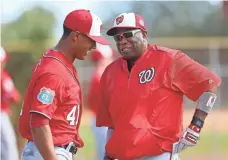  ?? LOGAN BOWLES, USA TODAY SPORTS ?? Dusty Baker, right, is good at eliciting laughter from those around him, including Nationals pitcher Joe Ross.