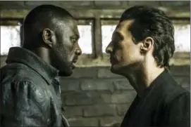  ?? ILZE KITSHOFF — COLUMBIA PICTURES — SONY VIA AP ?? This image released by Sony Pictures shows Idris Elba, left, and Matthew McConaughe­y in the Columbia Pictures film, “The Dark Tower.”