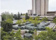  ?? Manu Fernandez / Associated Press ?? Tents outside a military hospital in Madrid are to be used to avoid overcrowdi­ng emergency wards.