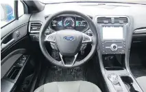  ??  ?? The 2017 Ford Fusion Sport’s instrument panel is uncluttere­d.