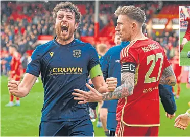  ?? ?? Dundee’s Joe Shaughness­y celebrates securing a top-six finish after the final whistle.