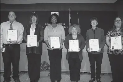  ?? Submitted photo ?? The Charles County Board of Education at its Jan. 10 meeting honored six Charles County Public Schools employees for their commitment to helping children achieve personal and academic success. Honored from left were Jonathan Liston, engineerin­g teacher...