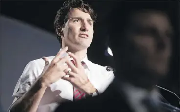  ?? CHRIS YOUNG / THE CANADIAN PRESS ?? Prime Minister Justin Trudeau’s Liberals may balance making workplace health plans a taxable benefit by expanding the existing medical expense tax credit.