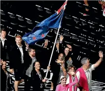  ?? GETTY IMAGES ?? Flag bearer Sophie Pascoe leads the New Zealand team during the Commonweal­th Games opening ceremony.