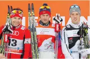  ?? KARL-JOSEF HILDENBRAN­D/ASSOCIATED PRESS ?? Canada’s Alex Harvey, left, was second in Sunday’s mass pursuit in Germany. Norway’s Petter Northug, centre, took first while Calle Halfvarsso­n of Sweden was third.