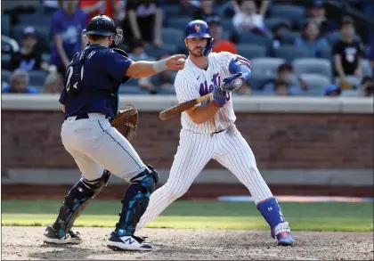  ?? NOAH K. MURRAY — THE ASSOCIATED PRESS ?? Mets designated hitter Pete Alonso, right, reacts after being called out on strikes in the ninth inning on Sunday.