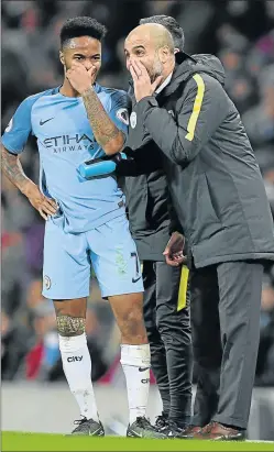  ?? Picture: AFP ?? A TALKING POINT: Manchester City’s Spanish manager Pep Guardiola, right, talks to Manchester City’s midfielder Raheem Sterling during the English Premier League match between the Citizens and Arsenal at the Etihad Stadium in Manchester over the weekend