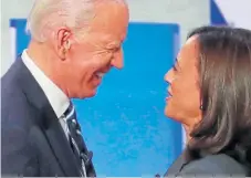  ?? /Reuters ?? Heating up: Former vicepresid­ent Joe Biden, left, has received a campaign boost with the backing of US senator Kamala Harris, who clashed with Biden in early debates.