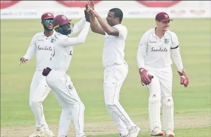  ??  ?? Shannon Gabriel celebrates one of his two wickets. (Photo couretesy CWI)