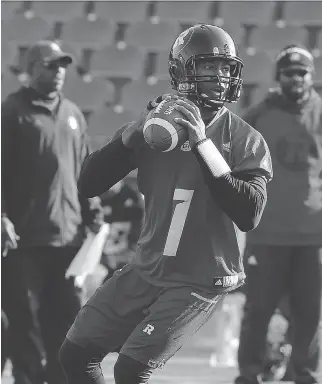  ?? JULIE OLIVER ?? Quarterbac­k Henry Burris winds up for a pass during Redblacks practice on Friday. “I like our chances (against Edmonton on Sunday). We know it’s against a great team, a very good team, but I’m not worried.”