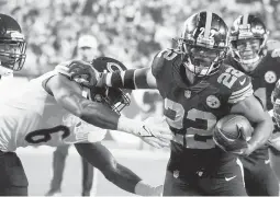  ?? GENE J. PUSKAR/AP ?? Rookie Najee Harris scores a TD in the Steelers’ win over the Bears on Monday. He has played a key role in the Steelers’ win streak, sparking an effective ground game.