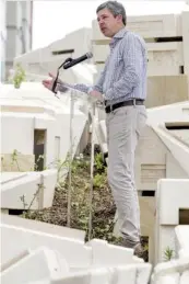  ?? STAFF PHOTO BY C.B. SCHMELTER ?? Mayor Andy Berke speaks during a ribbon cutting ceremony at the Scramble on Wednesday.