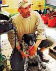  ?? COURTESY PHOTO ?? Michael Roberts with his walking companion, an Australian cattle dog.
