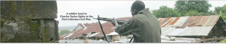  ??  ?? A soldier loyal to Charles Taylor fights in the
First Liberian Civil War.