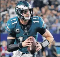  ?? AP PHOTO ?? Philadelph­ia Eagles quarterbac­k Carson Wentz in action during Sunday’s NFL game against the Dallas Cowboys in Arlington, Texas.