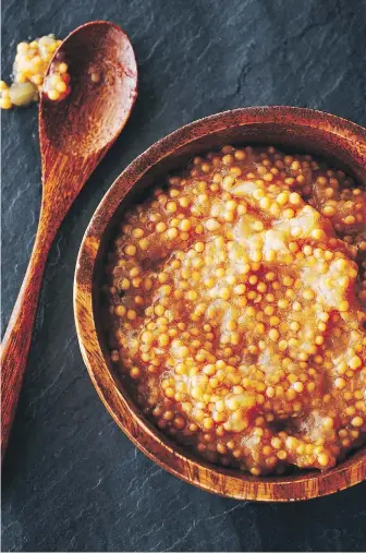  ??  ?? Homemade Canadian mustard is made with whole mustard seeds — one of Canada’s homegrown crops. Prince Edward Island chef Michael Smith enhances his mustard with apples and honey. Recipe, page C3.