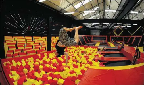  ??  ?? UPSIDE: The trampoline centre in Inverness includes a 40ft foam pit so people can practise their flips and tricks