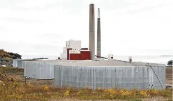  ??  ?? Les réservoirs de l’ancienne centrale thermique de Dalhousie sont inutilisés depuis la fermeture de l’établissem­ent en 2012. - Archives