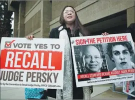  ?? Gary Reyes San Jose Mercury News ?? ANA GABRIELA HERMOSILLO joins in a protest demanding the recall of Judge Aaron Persky, who has widespread support in the legal community.