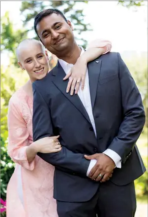  ?? SUBMITTED PHOTO ?? P.E.I. native Karen Nicholson poses with her husband, Taha Abbasi, after their wedding in Halifax, where she was being treated for leukemia. Just two days after her wedding last year, Nicholson found out her cancer was in remission, but it has since returned.