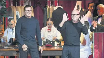  ??  ?? Italian fashion designers Domenico Dolce, right, and Stefano Gabbana.