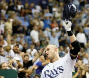  ?? MIKE CARLSON — THE ASSOCIATED PRESS FILE ?? In this Sept. 18, 2008 photo the Tampa Bay Rays’ Evan Longoria makes a curtain call in the seventh inning as fans applaud his third home run of the baseball game against the Minnesota Twins, in St. Petersburg, Fla. The San Francisco Giants have...