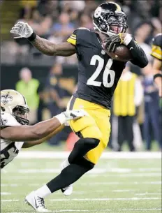  ?? Matt Freed/Post-Gazette ?? Running back Le'Veon Bell carries in the first quarter.