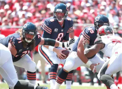  ??  ?? Mike Glennon was already a dubious pick to be the Bears’ starting quarterbac­k before they opened the season 0- 2. | JEFF HAYNES/ AP