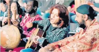  ?? BRAND USA ?? Rosanne Cash, daughter of singer Johnny Cash, sings “Land of Dreams’’ in a scene from a soon-to-air commercial promoting the U.S.