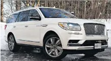  ?? CHRIS BALCERAK/DRIVING ?? David Booth and Neil Vorano agree: The 2018 Lincoln Navigator Reserve is a great vehicle with uncomforta­ble seats.